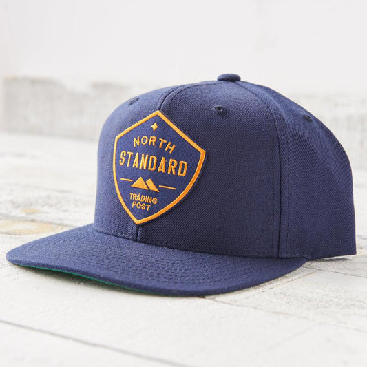 NSTP SNAPBACK NAVY WITH GOLD SHIELD-17755-O/SNVY-MENS HATS-NORTH STANDARD TRADI-JB Evans Fashions & Footwear