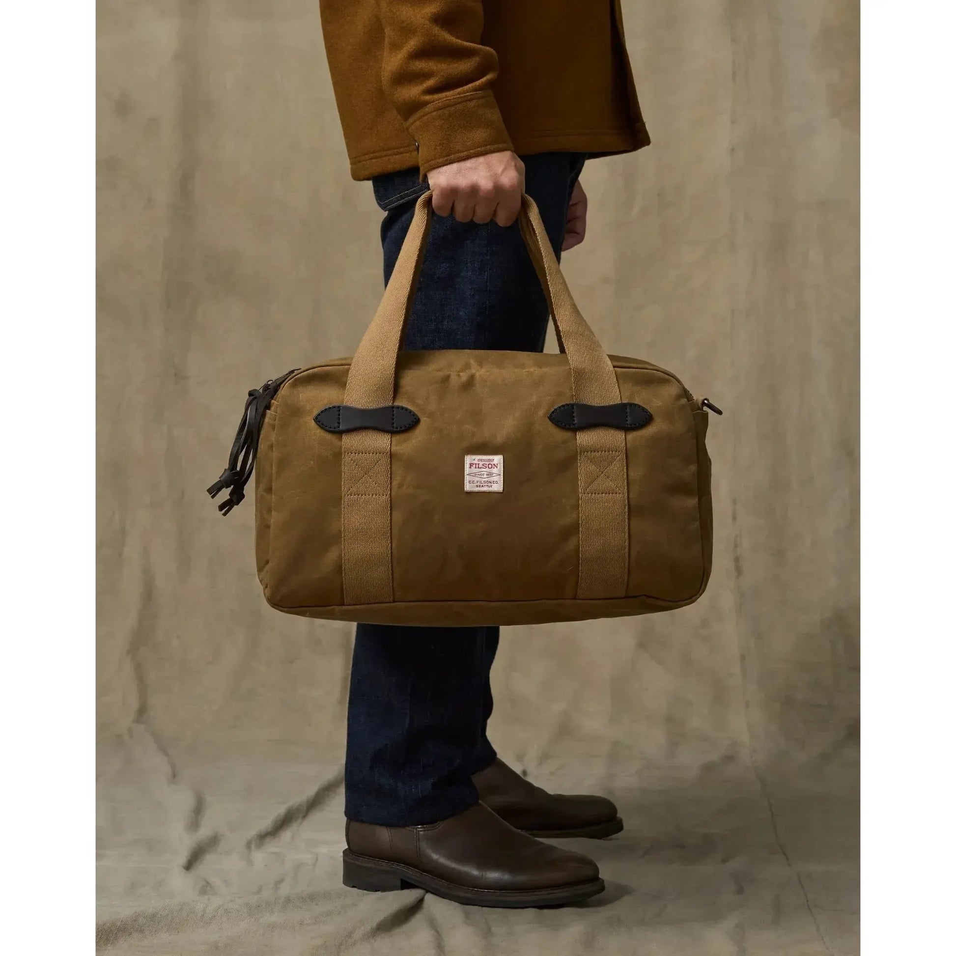 TIN CLOTH SMALL DUFFLE BAG DARK TAN-TRAVEL ACCESSORIES-FILSON-JB Evans Fashions & Footwear